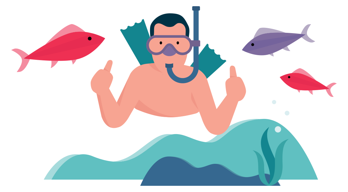 man snorkelt tussen de vissen