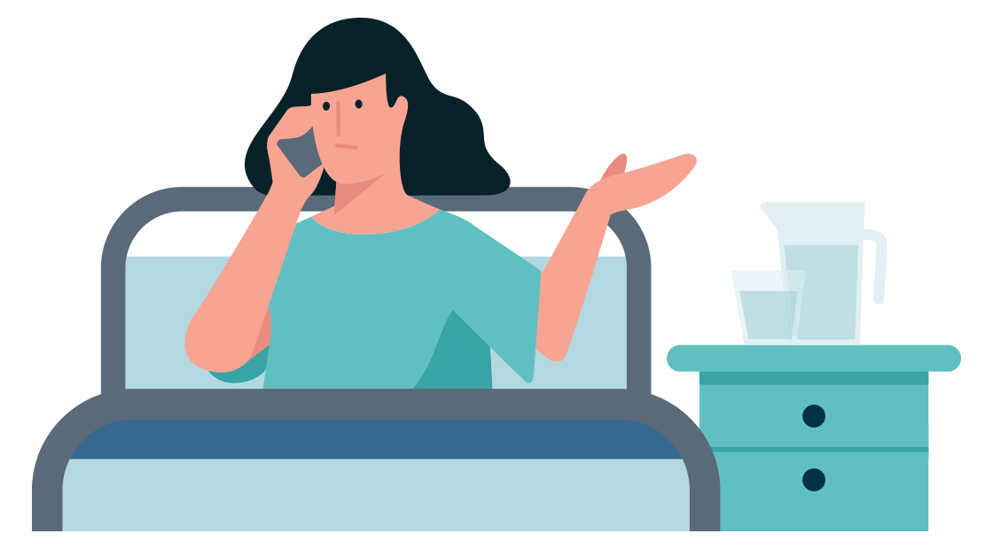 vrouw praat aan de telefoon in een ziekenhuisbed